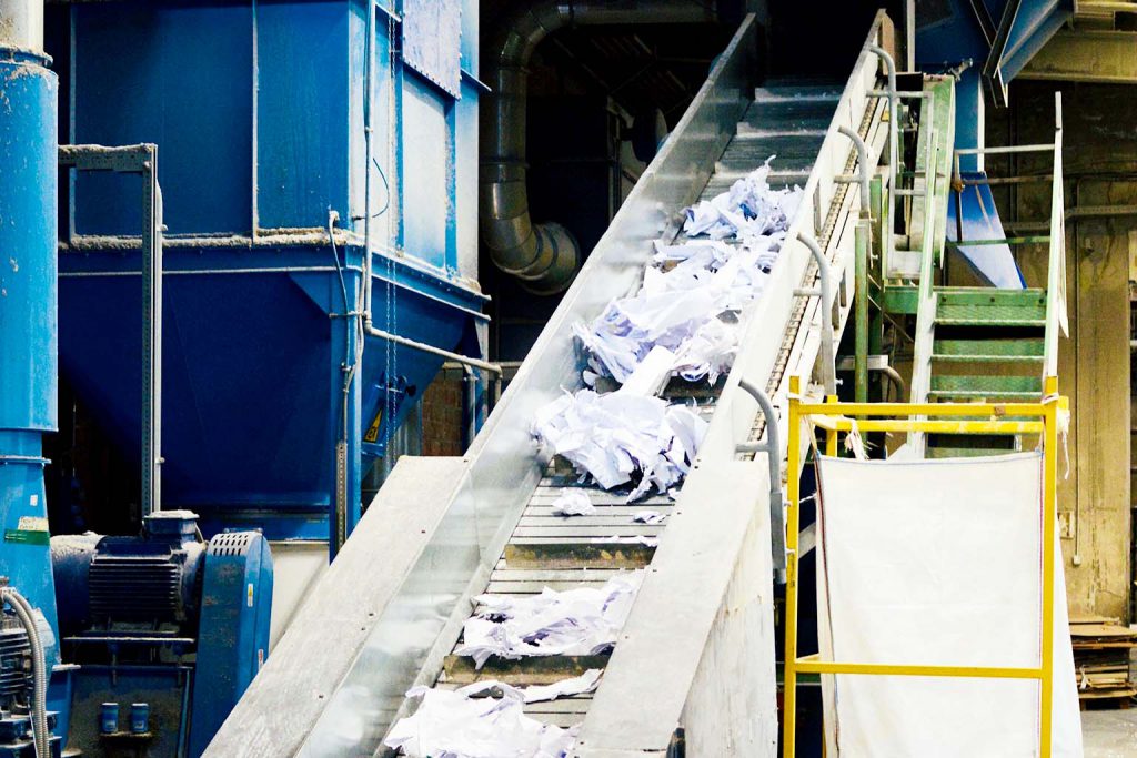 Conveyor belt for sieved Waste Paper